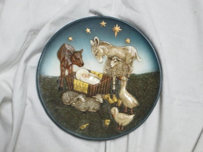 lot 211 image: Collector plate with raised image...