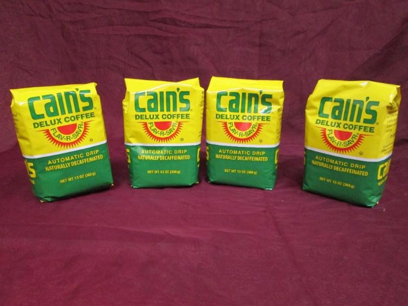 lot 214 image: Lot of 4- 13 oz bags of Cains deca...