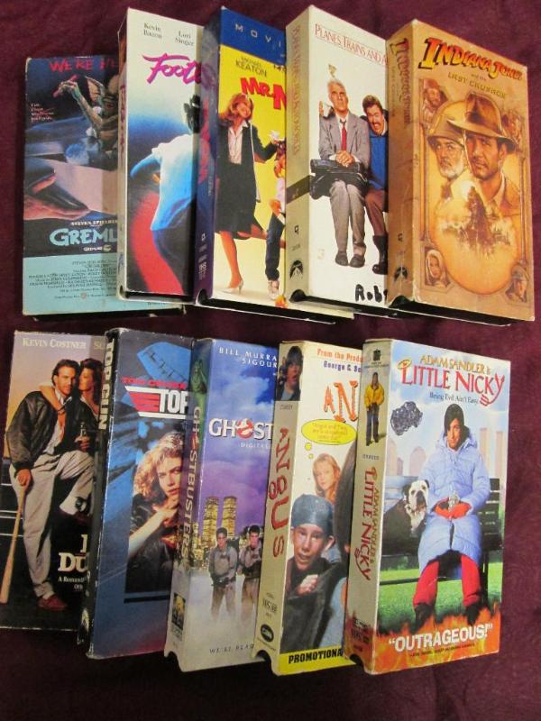 lot 216 image: Lot of 10 family videos on VHS tape...