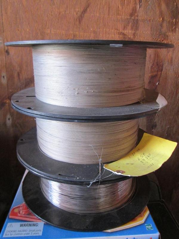 lot 46 image: 3 spools of fine wire. Size specifi...