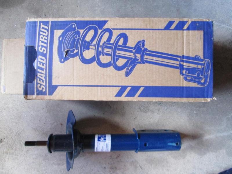 lot 53 image: Sealed strut for a 96 Lumina. New i...