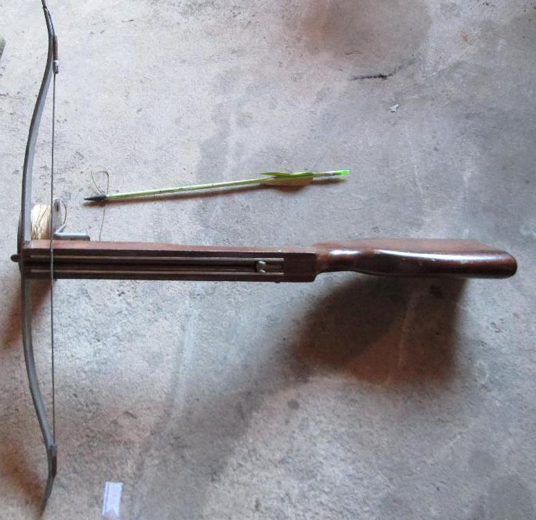 lot 70 image: Cross bow with lightning reel....