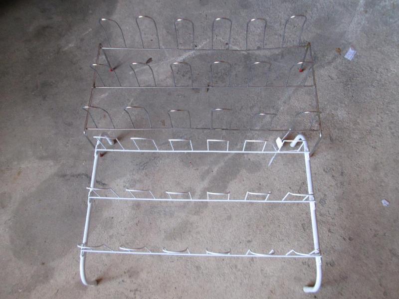 lot 81 image: Pair of shoe racks....