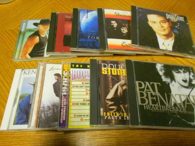 10 CDs from artist like Toby Keith...