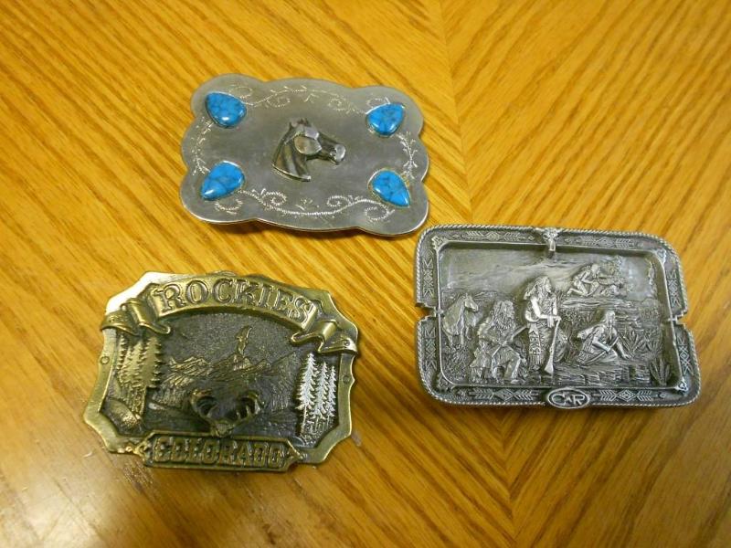 3 Medal belt buckles....