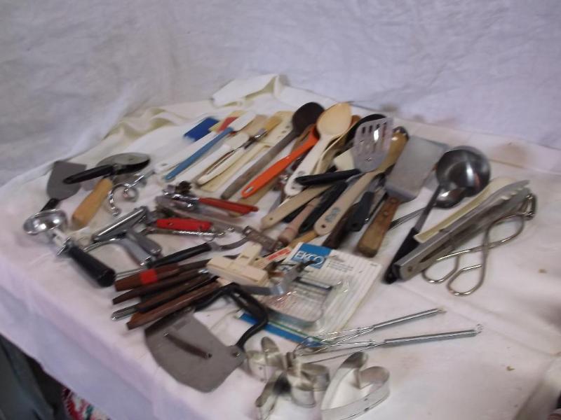 Large lot of kitchen utensils 64 it...