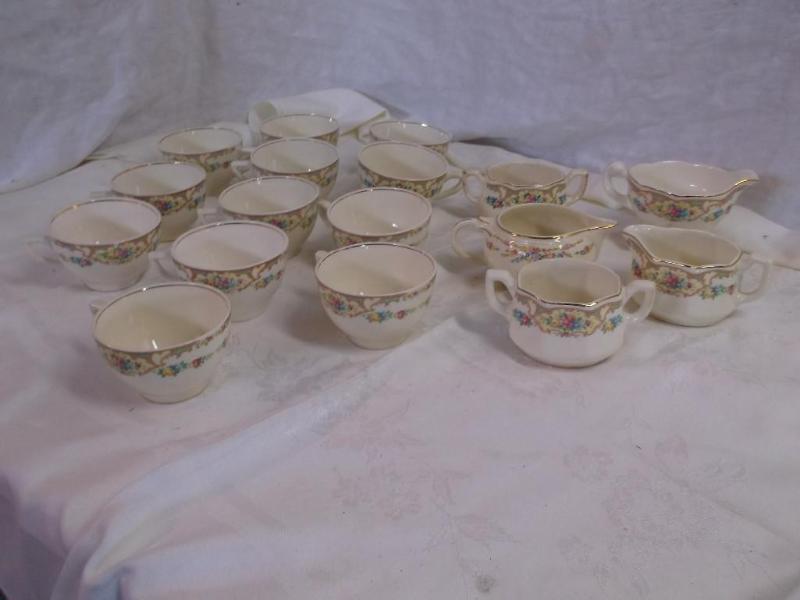 Lot of 12 cups,2 sugar dishes,3 cr...