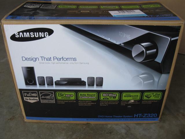 lot 12 image: New Samsung DVD home theater system...