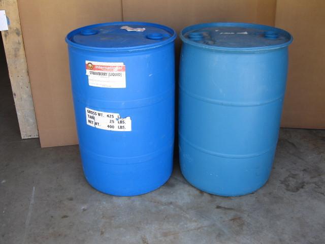 lot 32 image: 55 gallon barrels, poly, had flavor...
