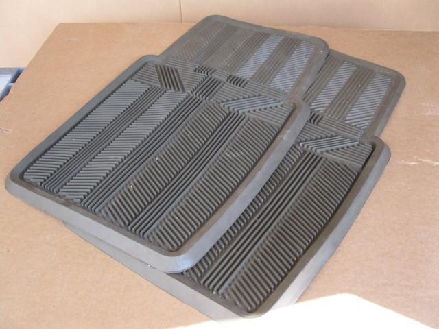 lot 56 image: Deep groove auto floor mats...