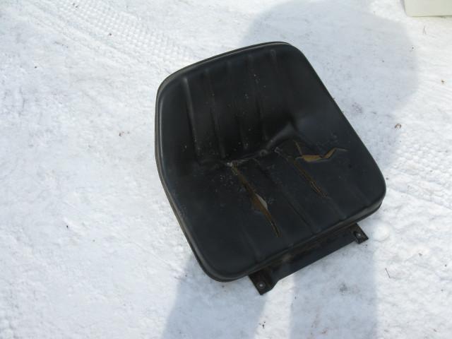 lot 58 image: tractor seat, used has tear in seat...