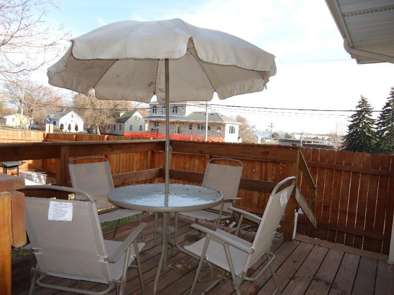 lot 10 image: 6 pc outdoor patio table. Some stai...
