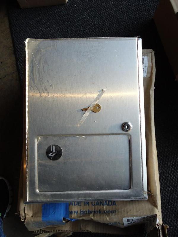 lot 27 image: New stainless steel Bobrick sanitar...
