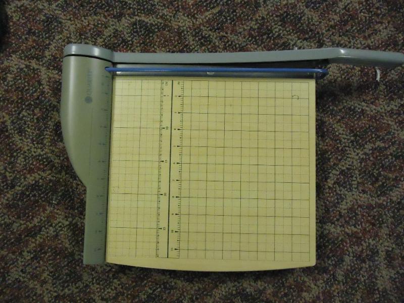 lot 56 image: Quartet paper cutter...