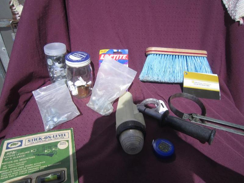 Box of misc levels bolts flashlight...