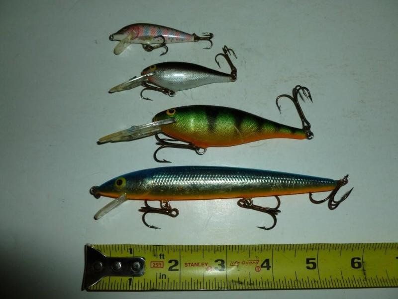 lot 102 image: Lot of four Rapala&nbspfishing cra...