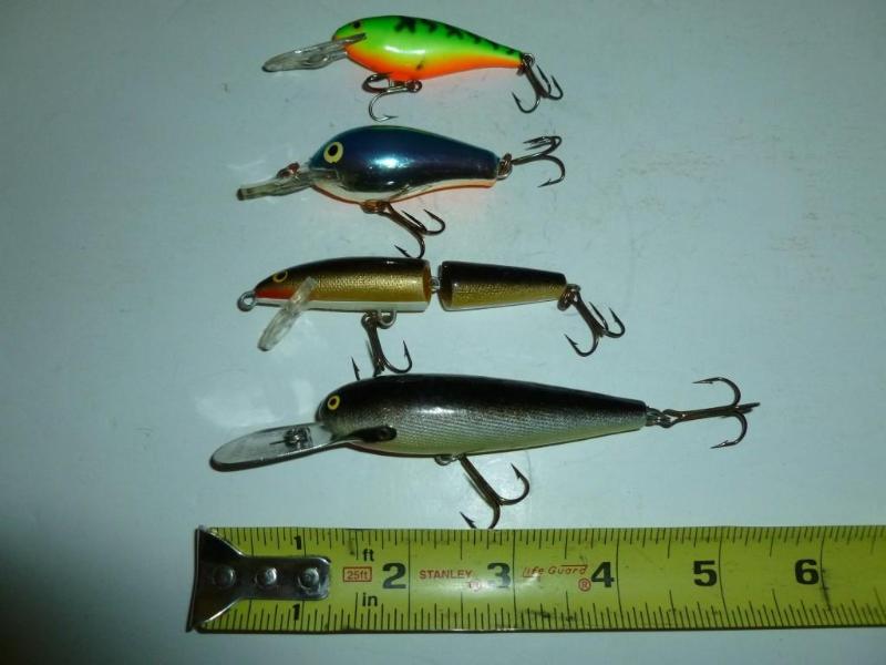 lot 103 image: Lot of four Rapala&nbspfishing cra...
