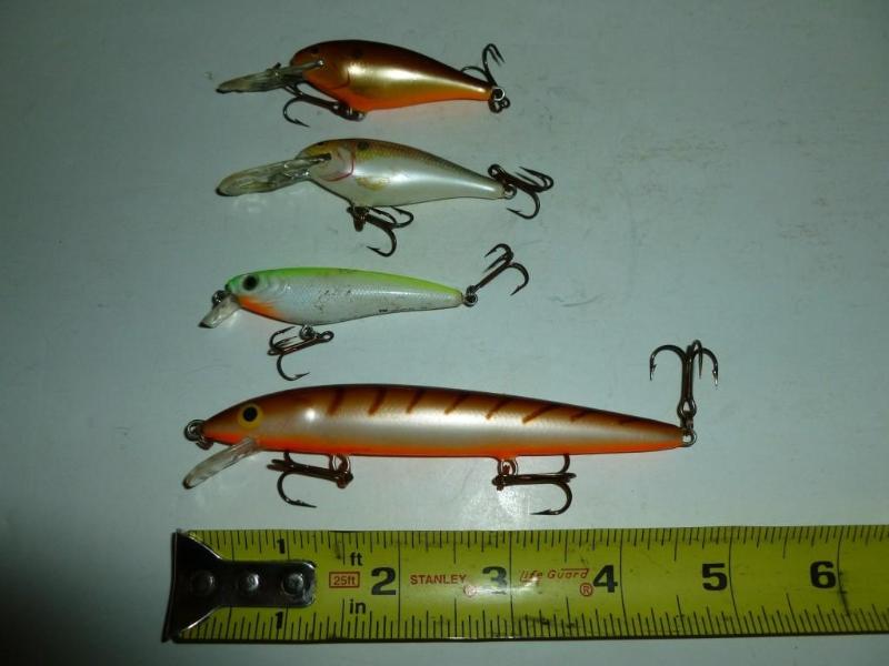 lot 105 image: Lot of three&nbspRapala&nbspand a...