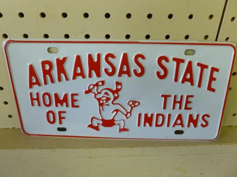 lot 151 image: Arkansas State embossed metal licen...