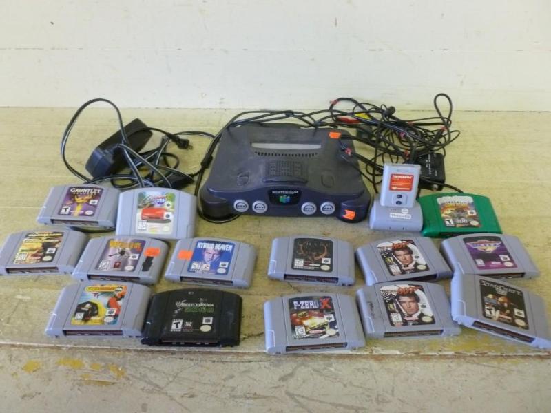 lot 174 image: Nintendo 64 game console with hooku...