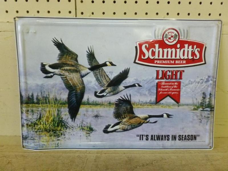 lot 18 image: Schmidts embossed metal beer sign ...