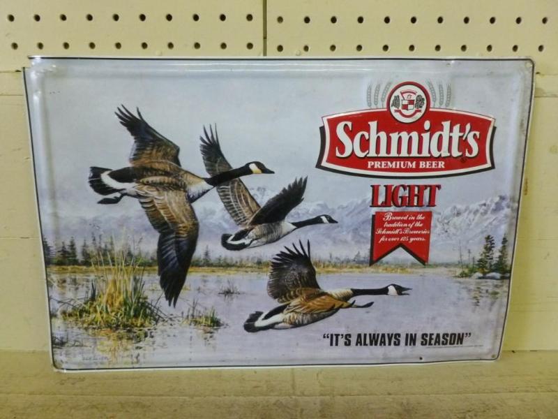 lot 19 image: Schmidts embossed metal beer sign ...