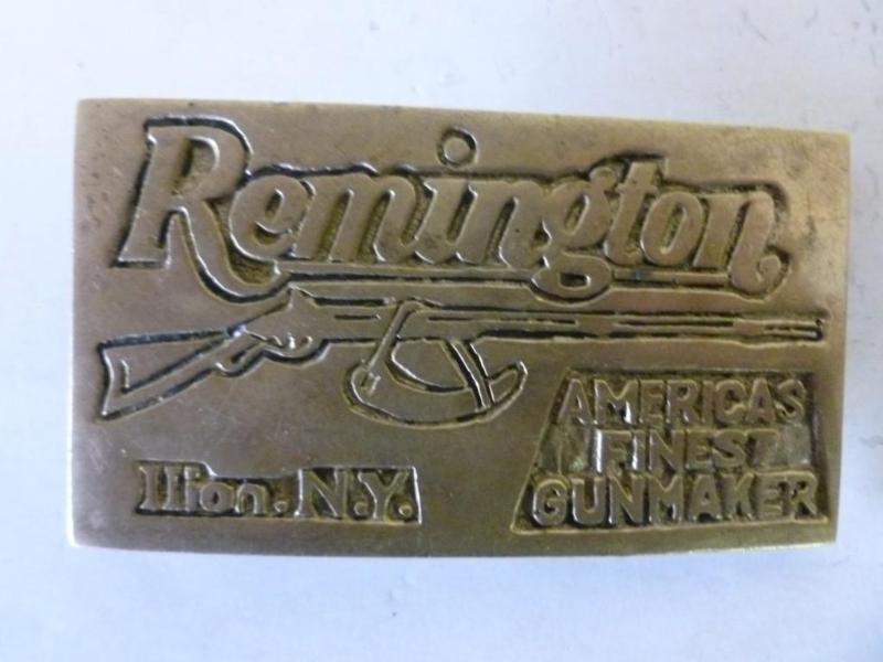 lot 73 image: Collectible Remington brass belt bu...