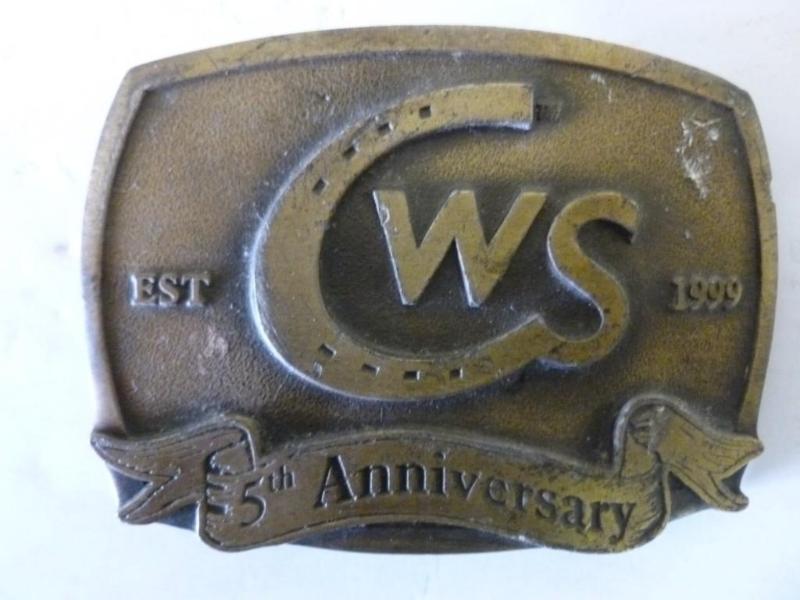 lot 74 image: Collectible CWS brass belt buckle t...