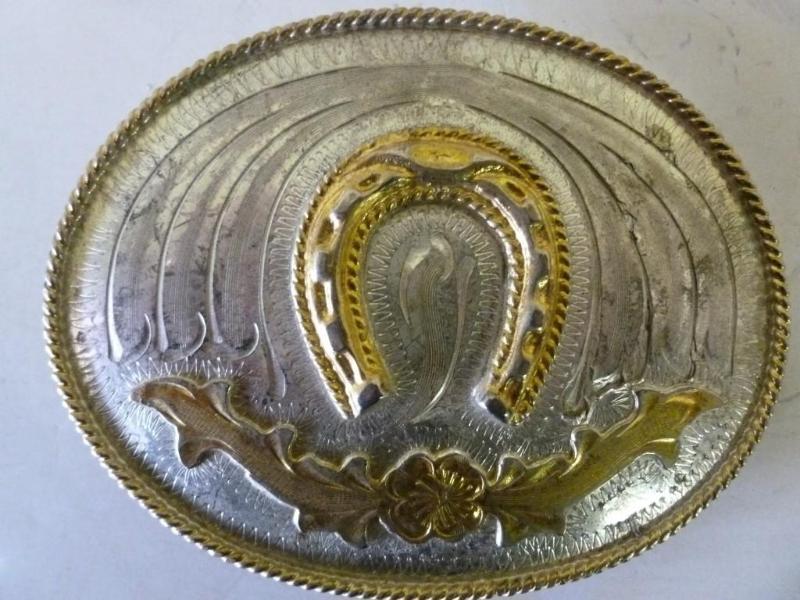 lot 75 image: Collectible silver plate belt buckl...