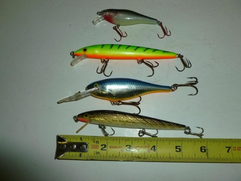 lot 94 image: Lot of four Rapala&nbspfishing cra...