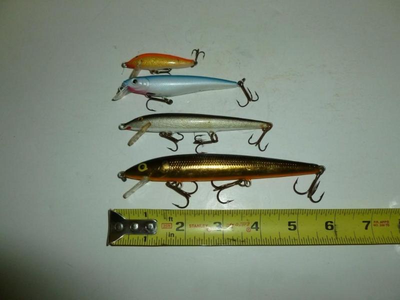 lot 95 image: Lot of three&nbspRapala&nbspand a...