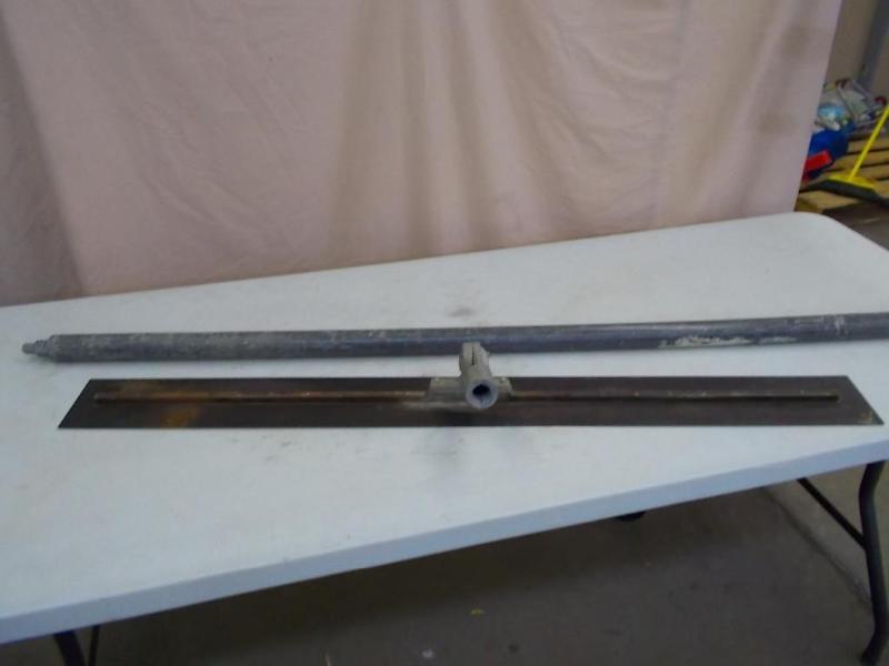 A 48&quot Blue Steel finish trowel...