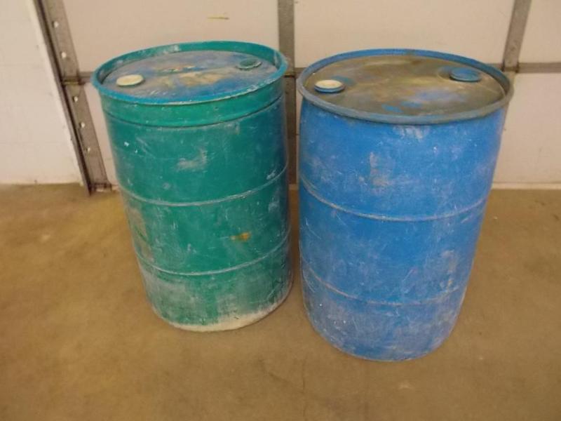 2 - 55 gallon plastic barrels used ...