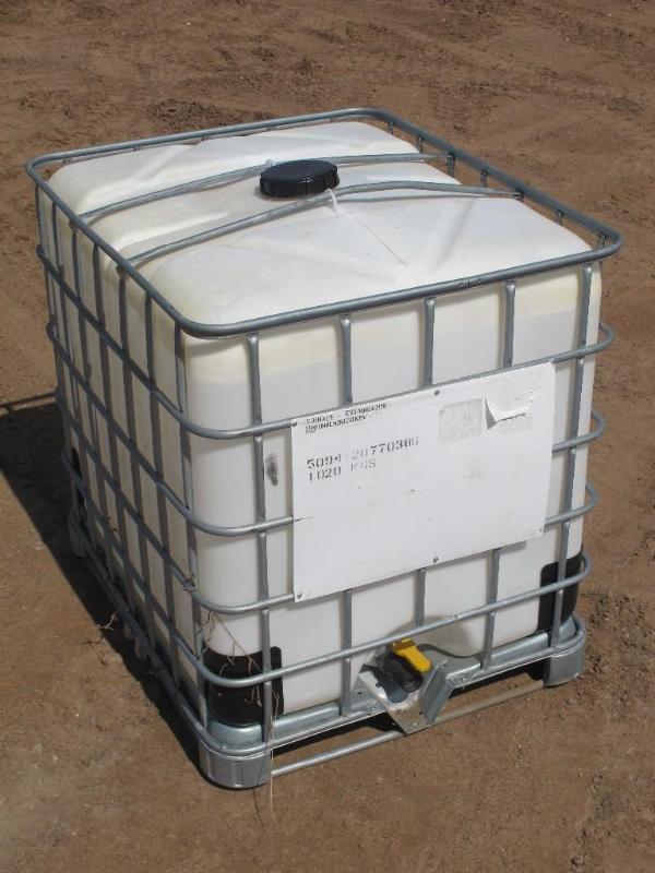 lot 26 image: Poly liquid storage tank in steel c...