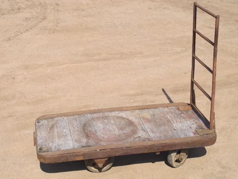 lot 27 image: Antique dock cart with cast iron wh...