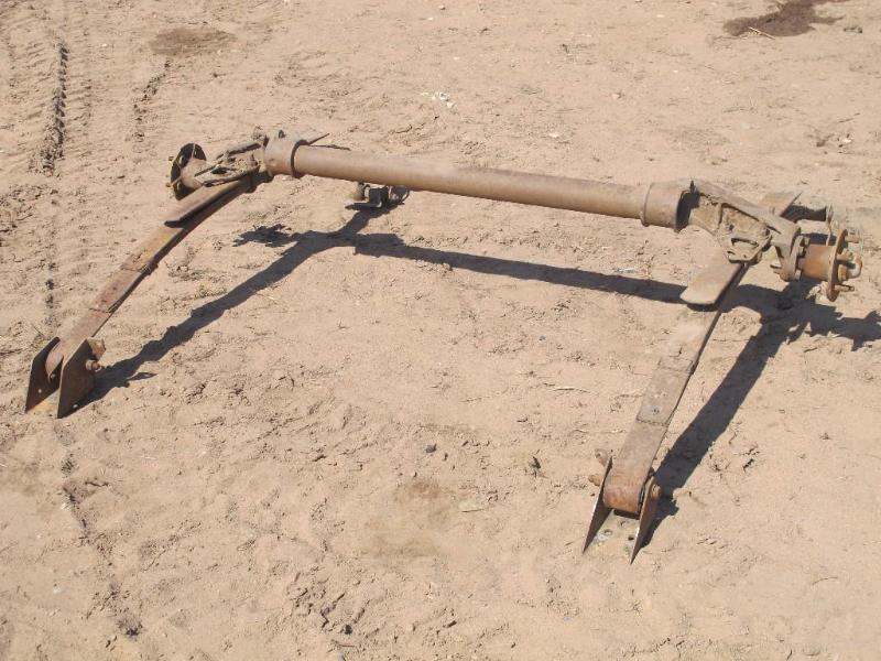lot 28 image: Trailer axle, 52" wide of outs...