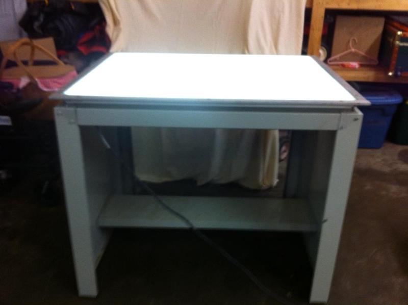 Lighted, glass top, craft table. Pe...