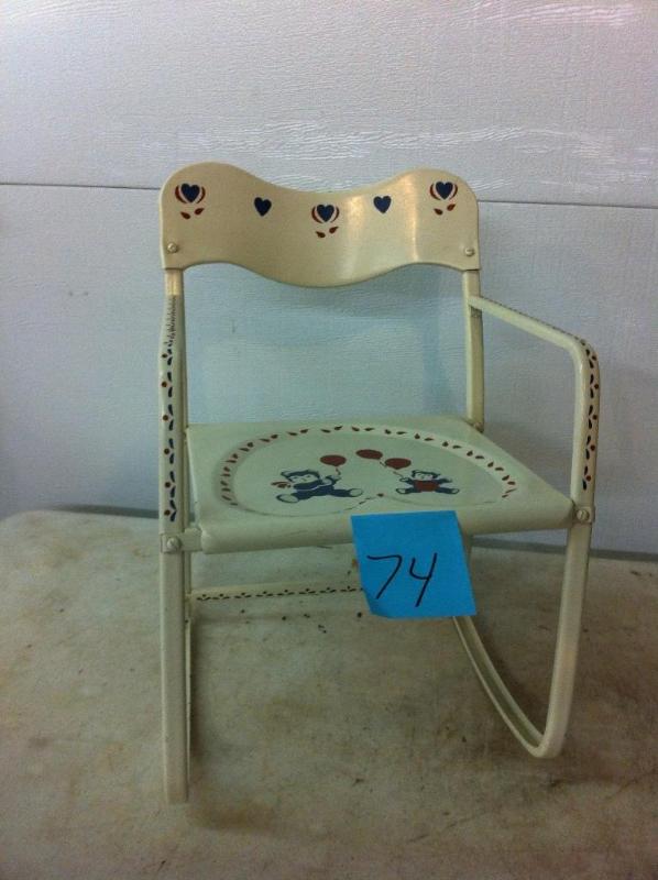 Antique child sized metal rocking c...