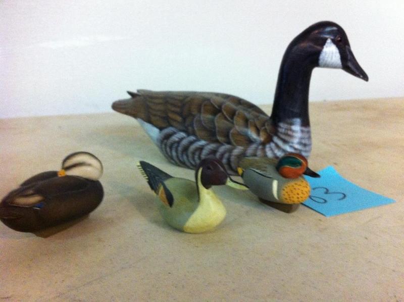 Goose and 3 ducks.  of the ducks a...