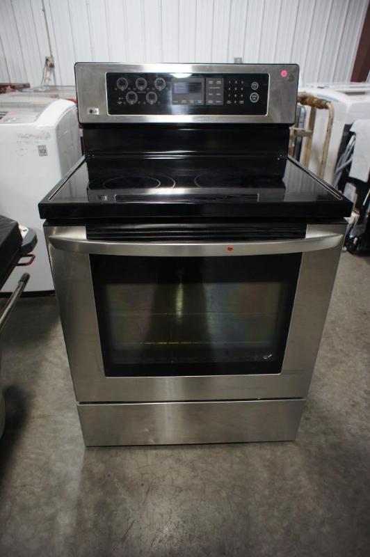 lot 6 image: LG Electric RangeUsed. LG - Stainl...