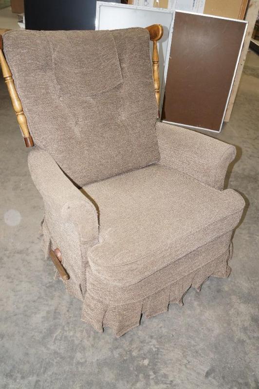 lot 10 image: Light brown RockerRecliner. The ba...