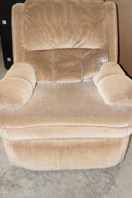 lot 12 image: Brown rockerrecliner, well worn....