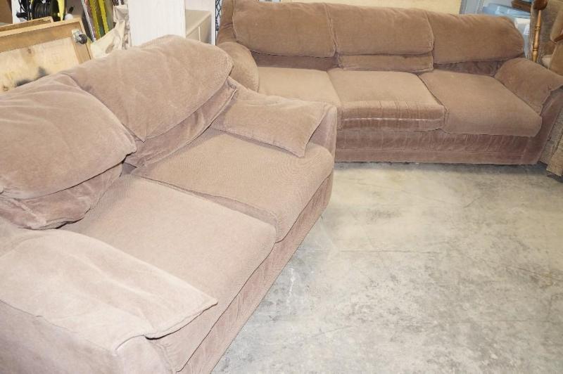 lot 15 image: Brown sofa and loveseat. &nbspBoth...