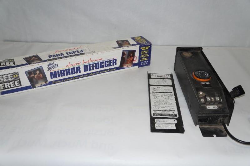 lot 20 image: One new electric bathroom mirror de...