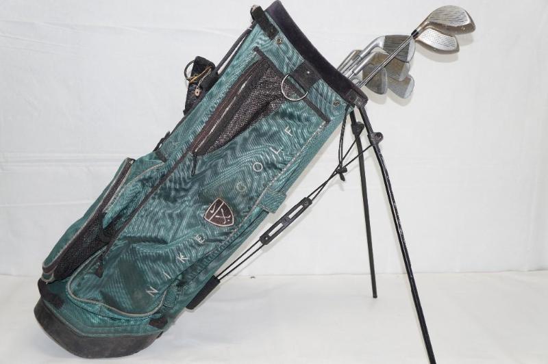 lot 4 image: Velocity VR golf clubs in a Nike Go...