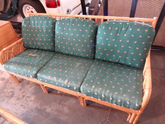lot 132 image: Bamboo cushioned sofa. Seat cushion...