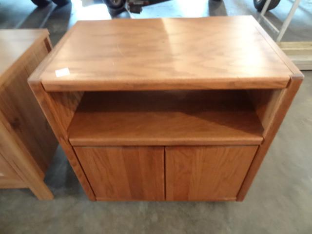 lot 140 image: Microwave cabinet on wheels. Wood. ...