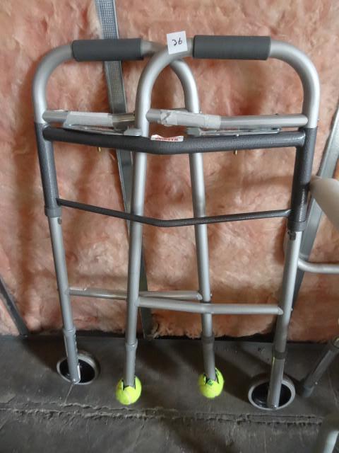 lot 36 image: Fold up walker...