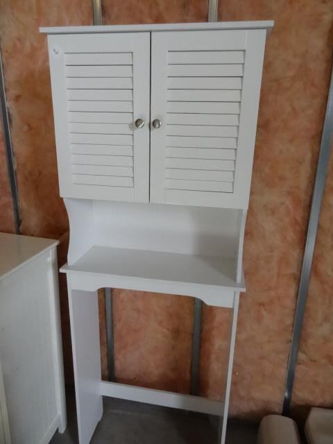 lot 40 image: Over the toilet cabinet. 24 x 9 x 6...