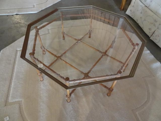 lot 53 image: Bamboo like coffee table with glass...